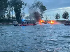 More than 20 people rescued from burning boat in Bronx, 1 man arrested, officials say